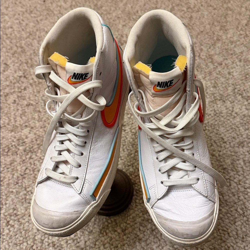 Nike Blazer Mid 77
Infinite Kumquat - orange, blue, red, and white